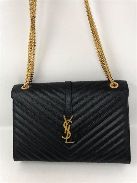 ysl black and gold clutch
